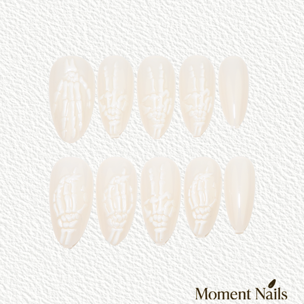Skeleton Gesture Press-On Nails | 3D Embossed Milky White Almond