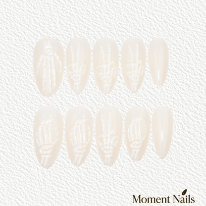 Skeleton Gesture Press-On Nails | 3D Embossed Milky White Almond
