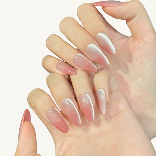  A set of handmade almond press-on nails with a white-to-rose-red cat-eye gradient, resembling a rose with morning dew.