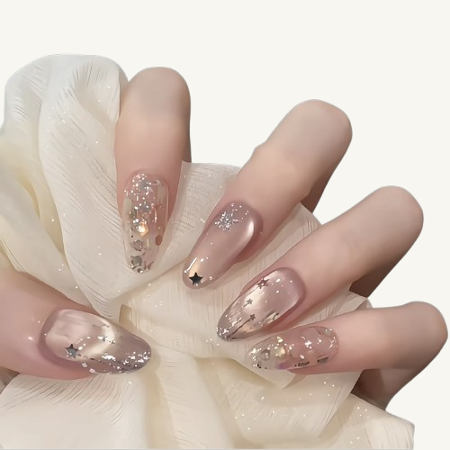 A set of soft shimmer glitter oval press-on nails with 3D silver stars and gold & silver foil flakes.